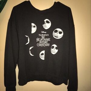 It's a Disney sweater it's a L and it's black & white